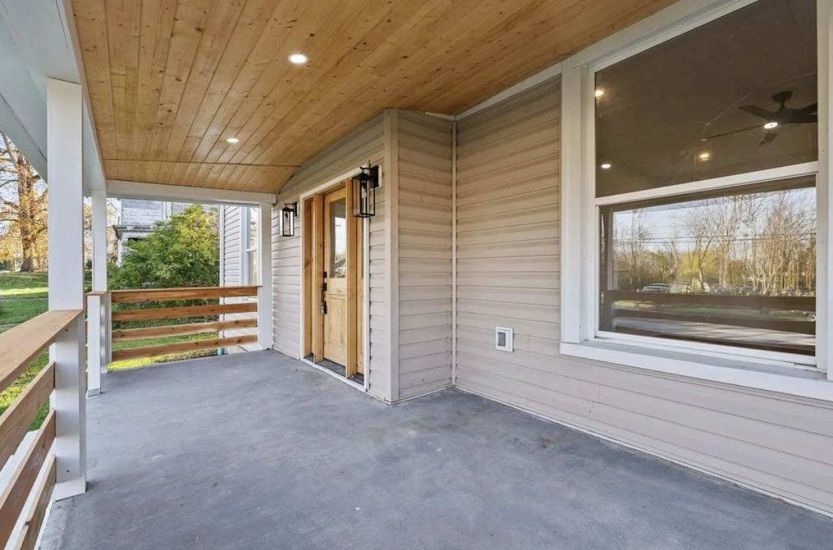 Covered porch with wood ceiling