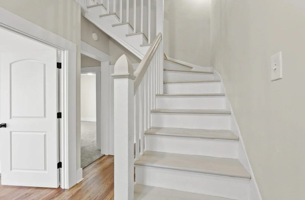 Remodeled staircase with white risers