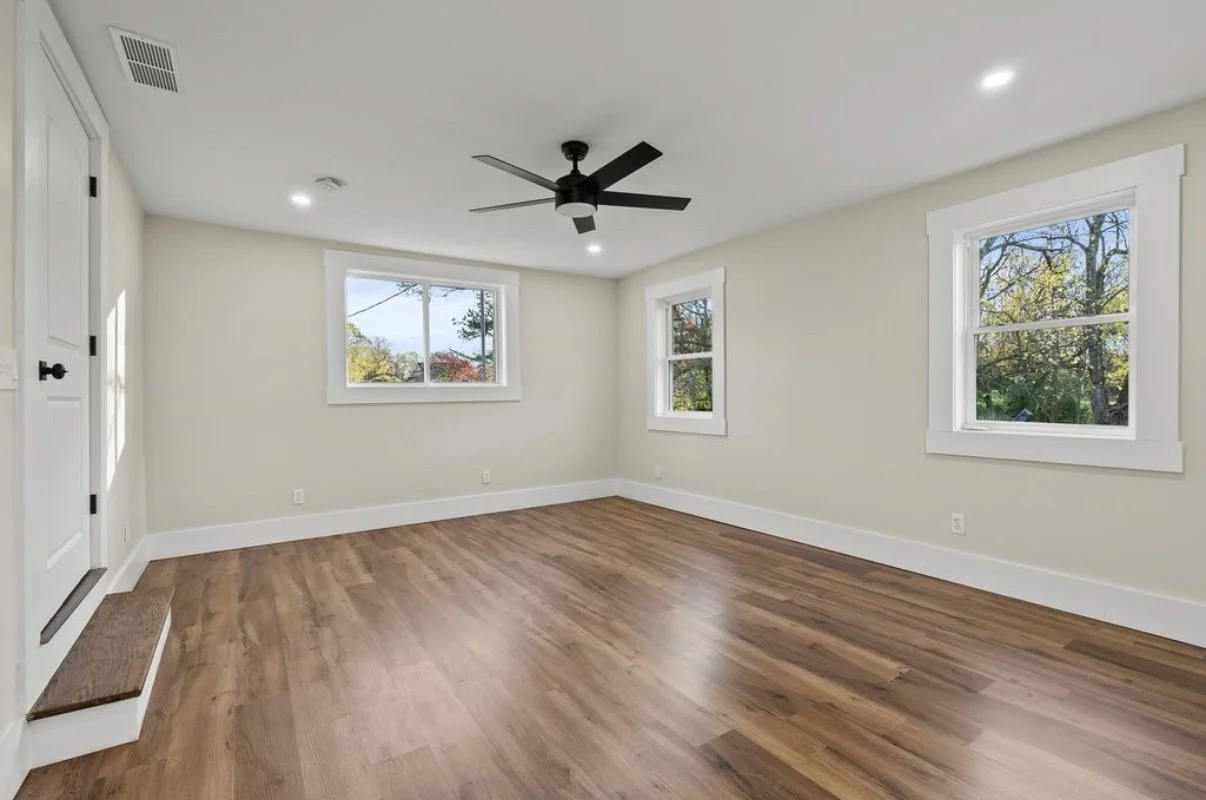 Bedroom with refinished hardwood floors