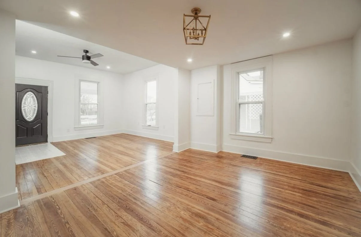 Bright renovated room with hardwood floors