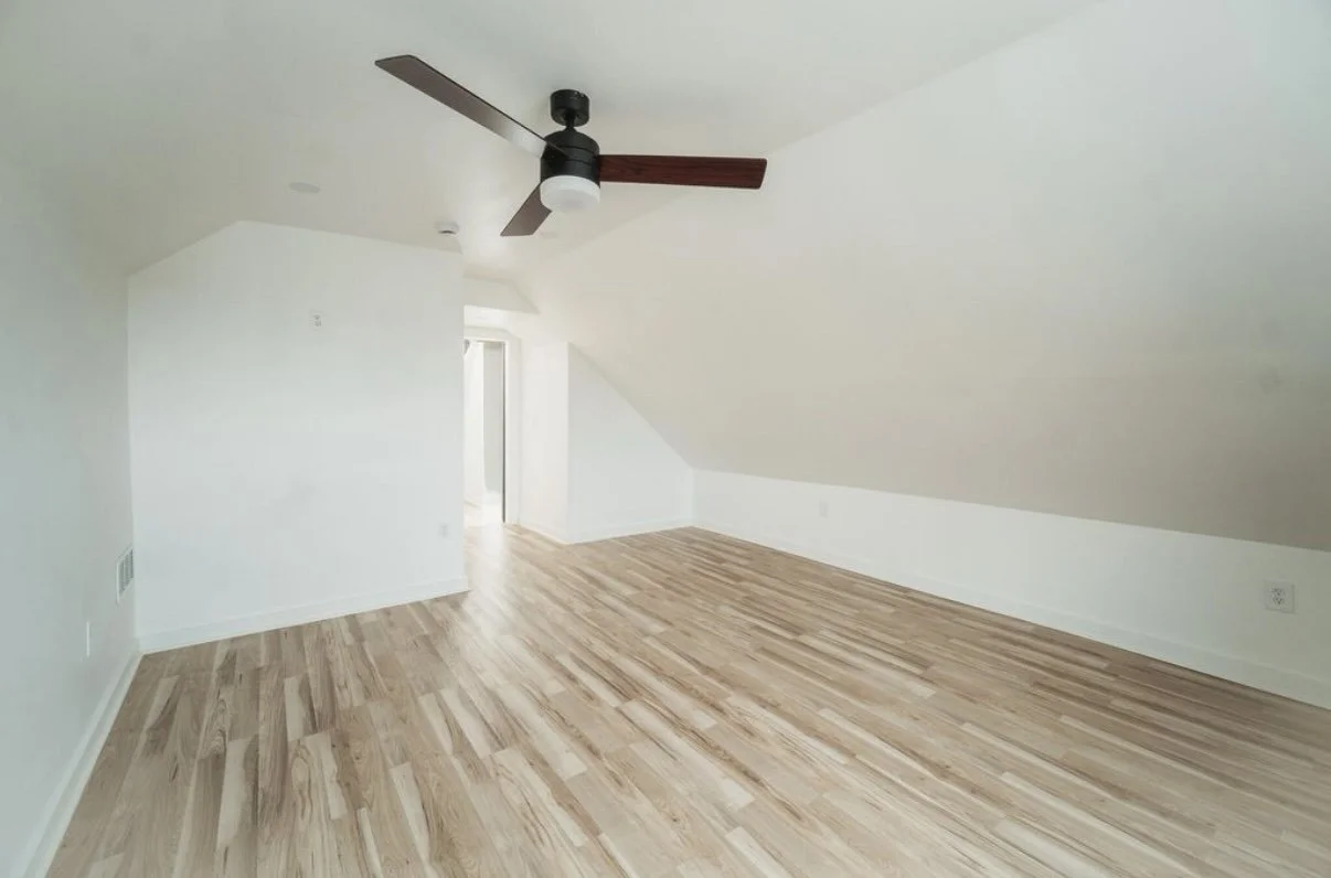 Finished attic room with new flooring