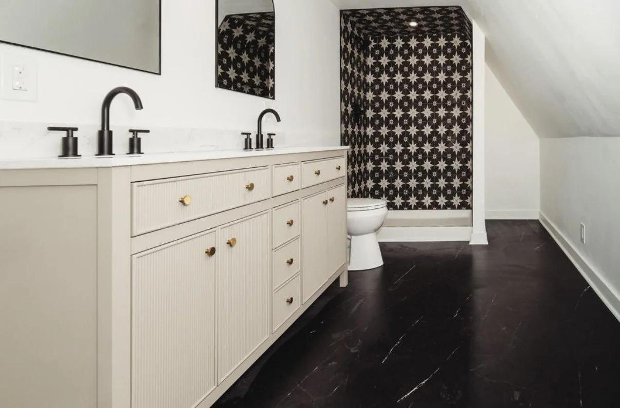 Bathroom remodel with double vanity and patterned accent wall