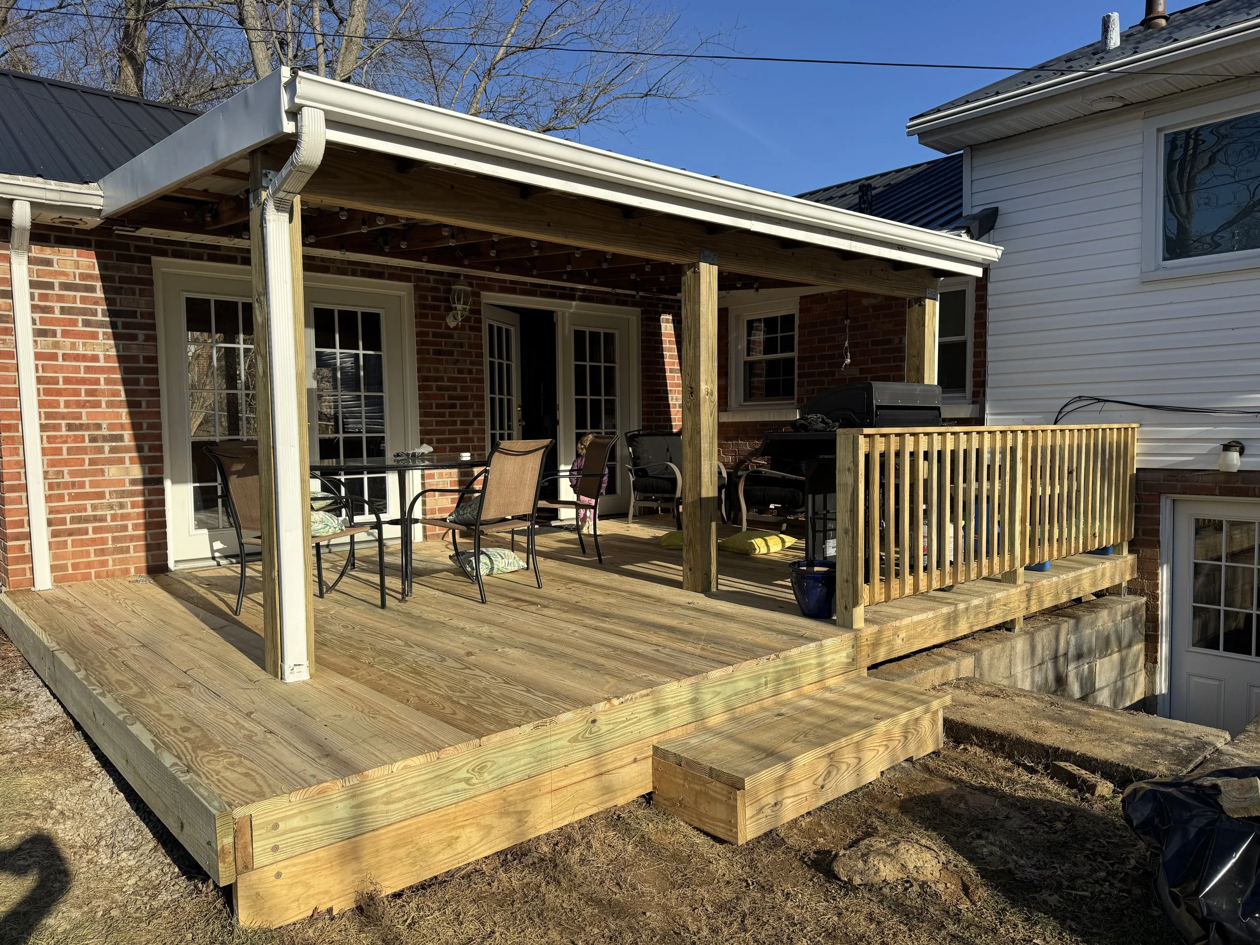New wood deck with covered porch